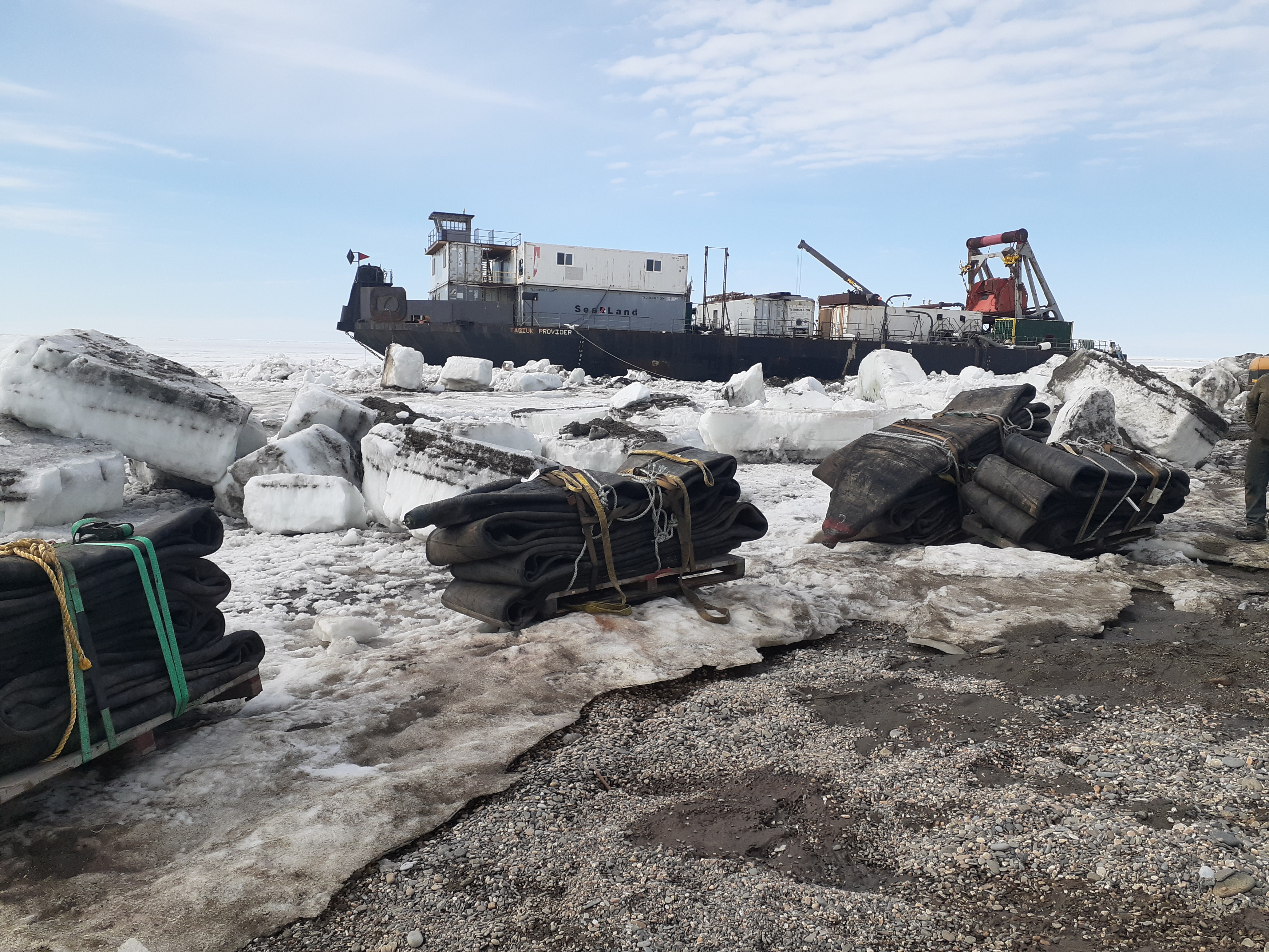 Vessel surrounded by ice and parts